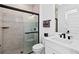 Bathroom with walk-in shower and modern vanity at 33157 Rosewood Bark Way, Wesley Chapel, FL 33545