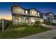 Two story home with a neutral color palette and landscaping at 33157 Rosewood Bark Way, Wesley Chapel, FL 33545