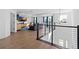 Open loft area overlooking the main level; perfect for office or den at 33157 Rosewood Bark Way, Wesley Chapel, FL 33545