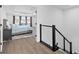 Upstairs hall with view of main bedroom and staircase at 33157 Rosewood Bark Way, Wesley Chapel, FL 33545