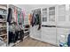 Large walk-in closet with ample shelving and hanging space at 33157 Rosewood Bark Way, Wesley Chapel, FL 33545
