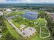 Aerial view of a community park with lake and walking paths at 4307 Gainsborough Ct, Tampa, FL 33624