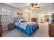 Spacious bedroom with plush bedding and ample closet space at 4307 Gainsborough Ct, Tampa, FL 33624