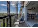 Private screened balcony with outdoor seating and preserve views at 4327 Bayside Village Dr # 202, Tampa, FL 33615