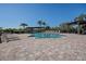 Inviting community pool with lounge chairs at 4327 Bayside Village Dr # 202, Tampa, FL 33615