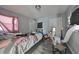 Bedroom with bed, dresser and gray walls at 5117 12Th S Ave, Gulfport, FL 33707