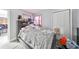 Bedroom with bed, gray walls, and wood floors at 5117 12Th S Ave, Gulfport, FL 33707