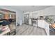 Kitchen with stainless steel appliances and view into living room at 5117 12Th S Ave, Gulfport, FL 33707