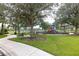 Community playground with play equipment, benches and shaded areas at 5308 105Th E Ter, Parrish, FL 34219