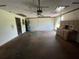 Attached garage with workbenches and an automatic garage door opener at 5404 Glover Dr, Weeki Wachee, FL 34607