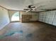 Spacious garage with storage cabinets and an automatic garage door at 5404 Glover Dr, Weeki Wachee, FL 34607