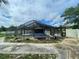 Large screened-in pool with concrete decking at 5404 Glover Dr, Weeki Wachee, FL 34607