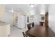 View of kitchen, dining area, and living room at 5618 Chipper Dr, New Port Richey, FL 34652