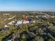 Aerial view of a townhome community showing building location and surrounding landscape at 5725 Desert Rose Pl, Tampa, FL 33615