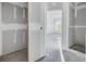 Unfinished bathroom with access to bedroom, awaiting completion at 5725 Desert Rose Pl, Tampa, FL 33615