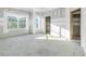 Large bedroom with access to another room, waiting for finishing touches at 5725 Desert Rose Pl, Tampa, FL 33615