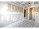 Unfinished bedroom with doors to other rooms at 5725 Desert Rose Pl, Tampa, FL 33615