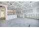 Unfinished kitchen area with island and hallway at 5725 Desert Rose Pl, Tampa, FL 33615