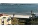 Elevated view of beach, water, and palm trees at 855 Bayway Blvd # 902, Clearwater Beach, FL 33767