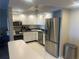 Modern kitchen with stainless steel appliances at 855 Bayway Blvd # 902, Clearwater Beach, FL 33767