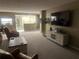 Living room with a view into the kitchen area at 855 Bayway Blvd # 902, Clearwater Beach, FL 33767