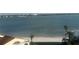 Beachfront property with palm trees and calm water at 855 Bayway Blvd # 902, Clearwater Beach, FL 33767