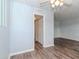 Hallway with light walls and wood-look flooring at 1001 77Th N Ave # 104, St Petersburg, FL 33702