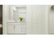 Clean bathroom with a white vanity and storage at 10269 Purple Leaf Ct, Riverview, FL 33578