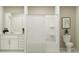 Bathroom with white vanity, bathtub, and shower at 10269 Purple Leaf Ct, Riverview, FL 33578