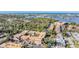 Panoramic aerial shot featuring condo complex nestled near waterfront, showcasing location at 12760 Indian Rocks Rd # 582, Largo, FL 33774