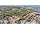 Beautiful aerial perspective of a condo complex in wooded area, close to waterfront at 12760 Indian Rocks Rd # 582, Largo, FL 33774
