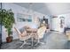 Dining area featuring a round table with chairs and a plant in corner at 12760 Indian Rocks Rd # 582, Largo, FL 33774