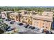 Tan two-story building with parking lot at 12760 Indian Rocks Rd # 582, Largo, FL 33774