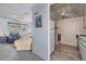 View of the living room and kitchen with white appliances at 12760 Indian Rocks Rd # 582, Largo, FL 33774