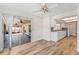 Dining room with hardwood floors and access to a screened patio at 14905 Pelican Point Pl, Tampa, FL 33625