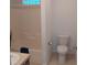 Clean bathroom with a tub, toilet, and sink at 1760 Dorothy Blvd, Lutz, FL 33558