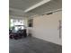 Covered carport with golf cart and exterior utility hookups at 1760 Dorothy Blvd, Lutz, FL 33558