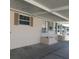 Exterior view showing covered carport and home entrance at 1760 Dorothy Blvd, Lutz, FL 33558