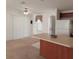 Open concept kitchen with breakfast bar and wood cabinets at 1760 Dorothy Blvd, Lutz, FL 33558