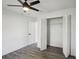 Light bedroom featuring wood-look floors and a ceiling fan at 1814 Tarah Trace Dr, Brandon, FL 33510