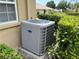 Carrier AC unit located outside the home at 3259 Hilary Cir # 1A, Palm Harbor, FL 34684