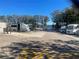 Parking lot with RVs and boats near a lake at 3259 Hilary Cir # 1A, Palm Harbor, FL 34684