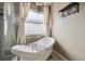 Elegant bathroom with freestanding tub, shower, and updated fixtures at 3512 Heron Island Dr, New Port Richey, FL 34655