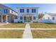 Two-story house with gray accents and a front porch at 4501 21St N St, St Petersburg, FL 33714