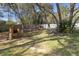 Backyard with stone fire pit and picnic table at 5171 Bone Ln, Brooksville, FL 34604