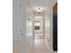 Bright hallway with access to backyard and other rooms at 5171 Bone Ln, Brooksville, FL 34604