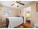 Small bedroom with ceiling fan and adjacent bedroom view at 604 Westbrook Ave, Brandon, FL 33511