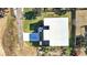 Aerial view of house and large backyard garden at 6117 E 113Th Ave, Temple Terrace, FL 33617