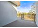 Private balcony with metal railings and park views at 6117 E 113Th Ave, Temple Terrace, FL 33617