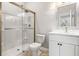 Bathroom with a walk-in shower and modern vanity at 6117 E 113Th Ave, Temple Terrace, FL 33617